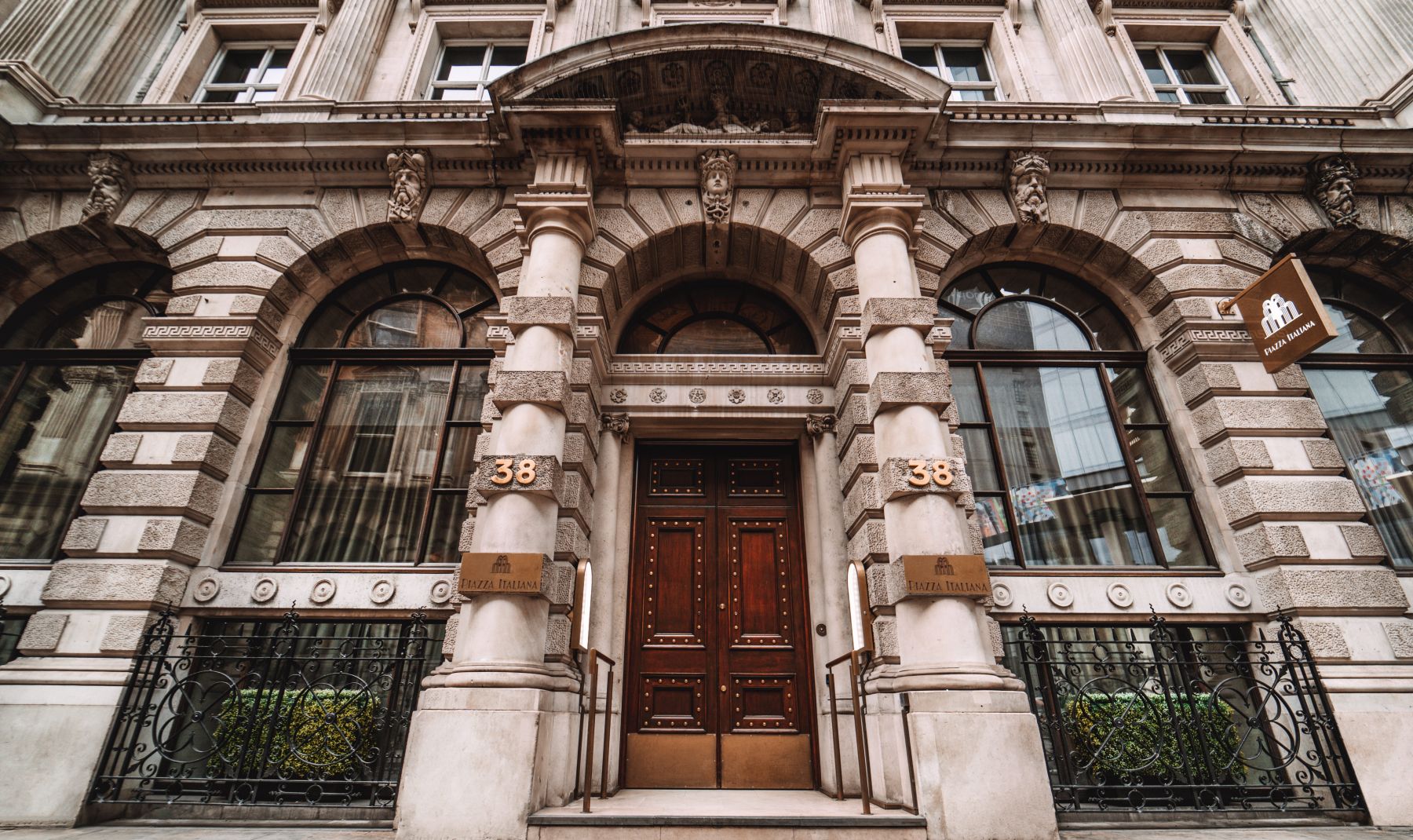 a building with columns and a door